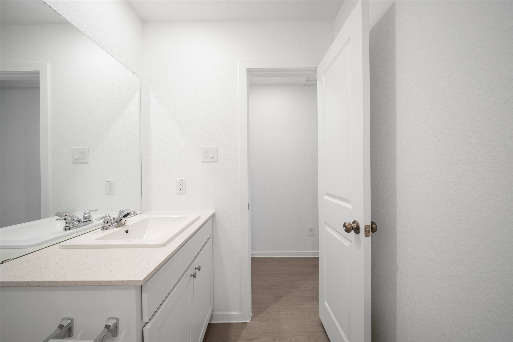 31436 Moore Road Magnolia, TX 77354 - Photo 20 of 25 a bathroom with a sink and a mirror
