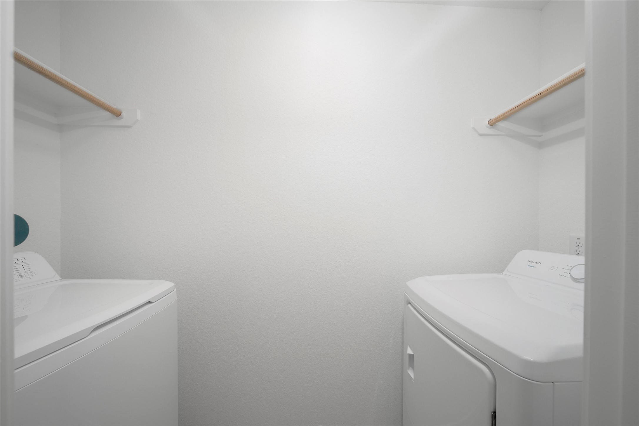 31436 Moore Road Magnolia, TX 77354 - Photo 22 of 25 a utility room with dryer and washer