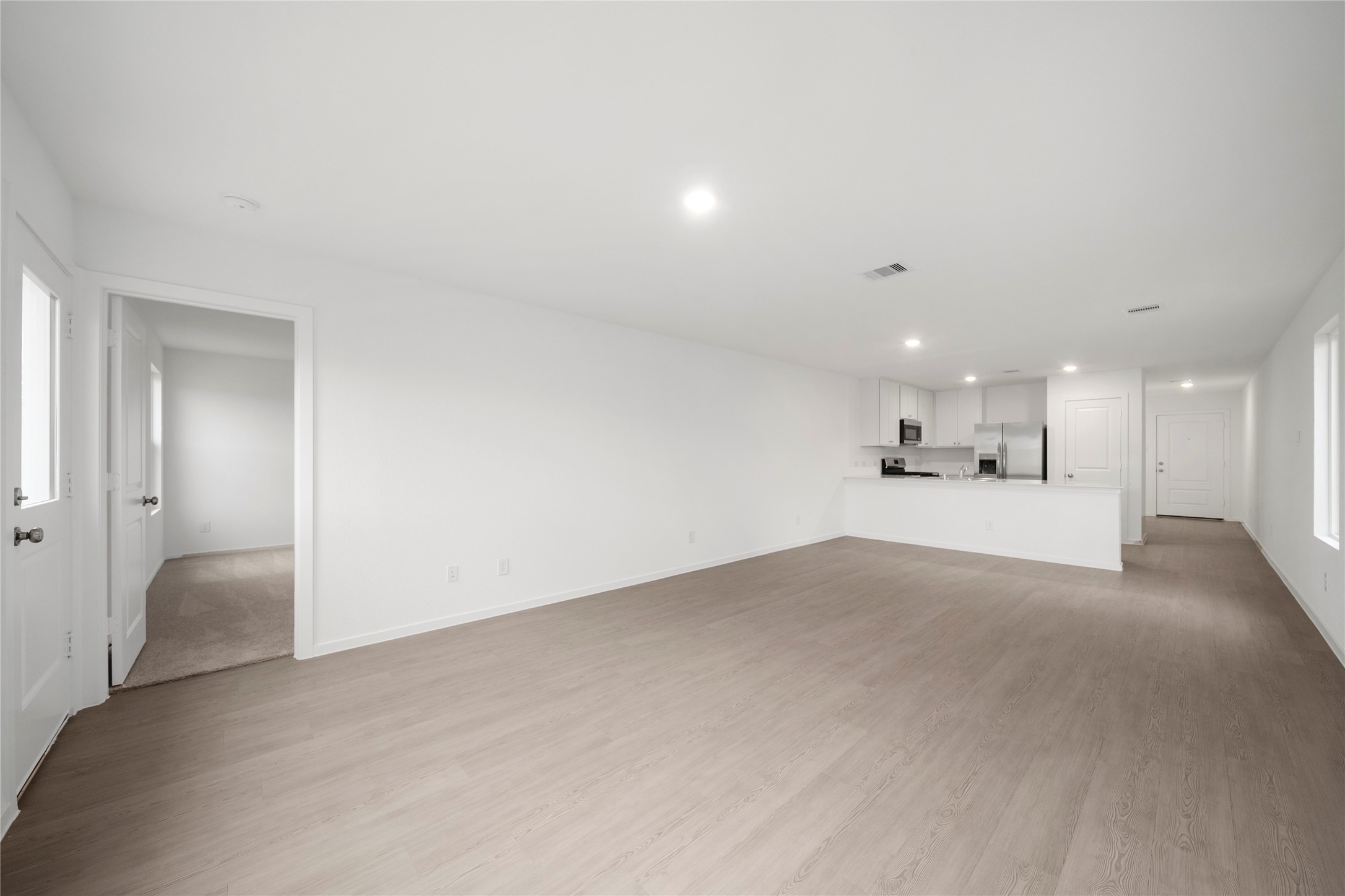 31436 Moore Road Magnolia, TX 77354 - Photo 9 of 25 a view of a big room with closet and windows
