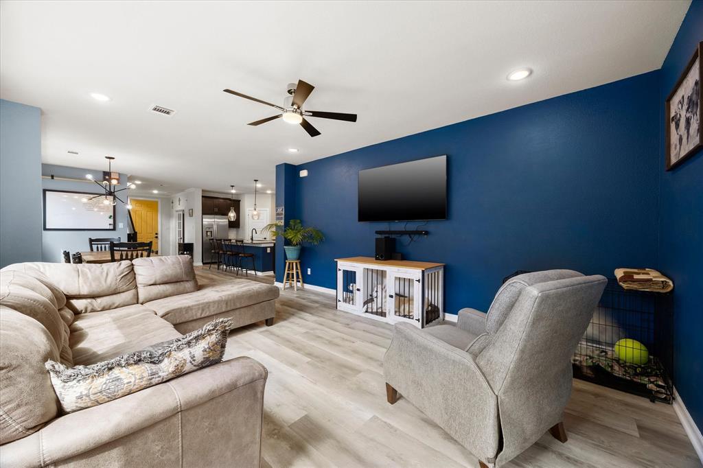 9224 Lamar Street Rowlett, TX 75089 - Photo 9 of 27 Open-concept living space featuring wood-finish flooring, recessed lighting, and a modern ceiling fan