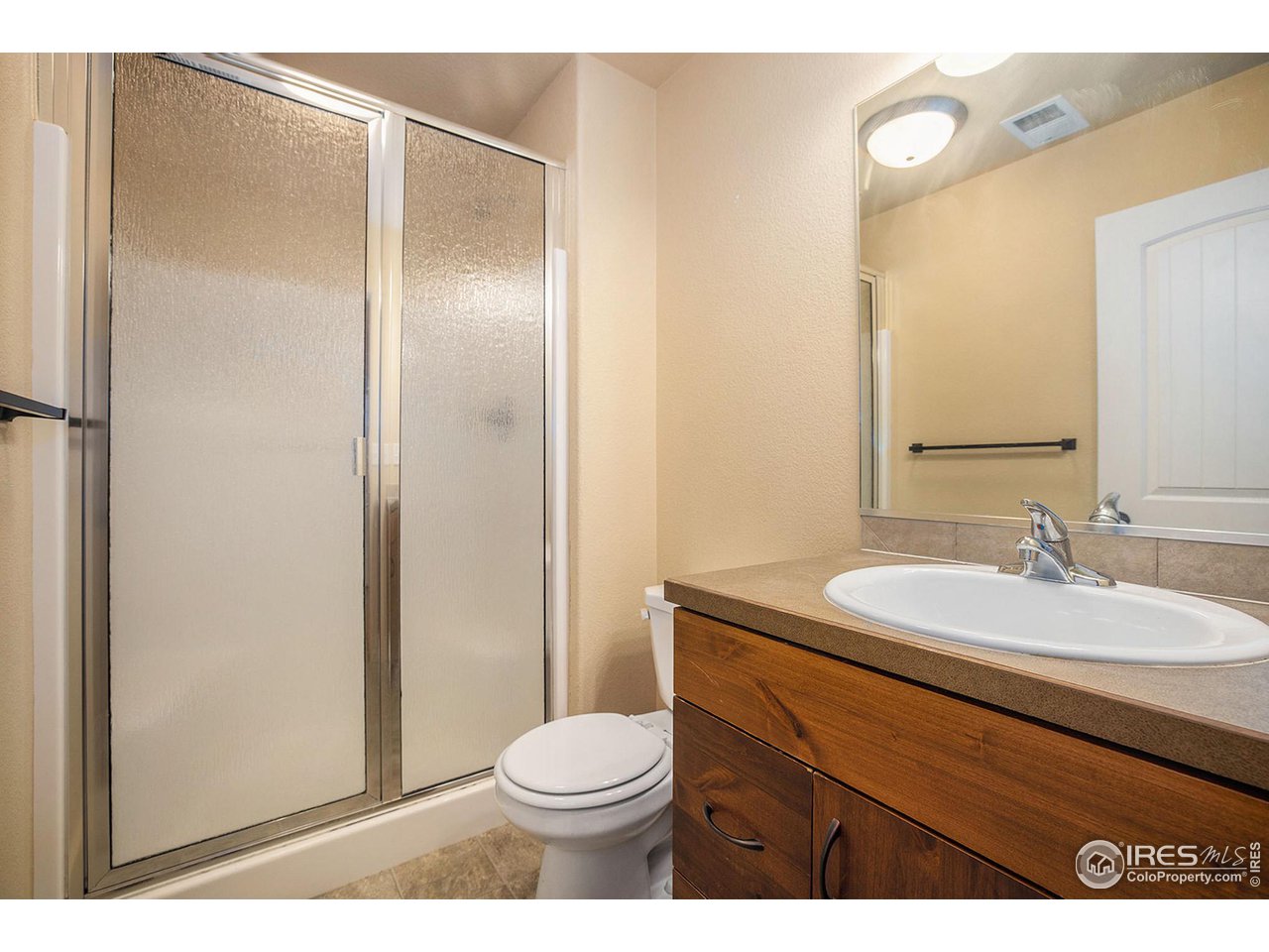 1001 23rd Street Road Greeley, CO 80631 - Photo 29 of 40 The first bathroom, near the entrance and two of the bedrooms