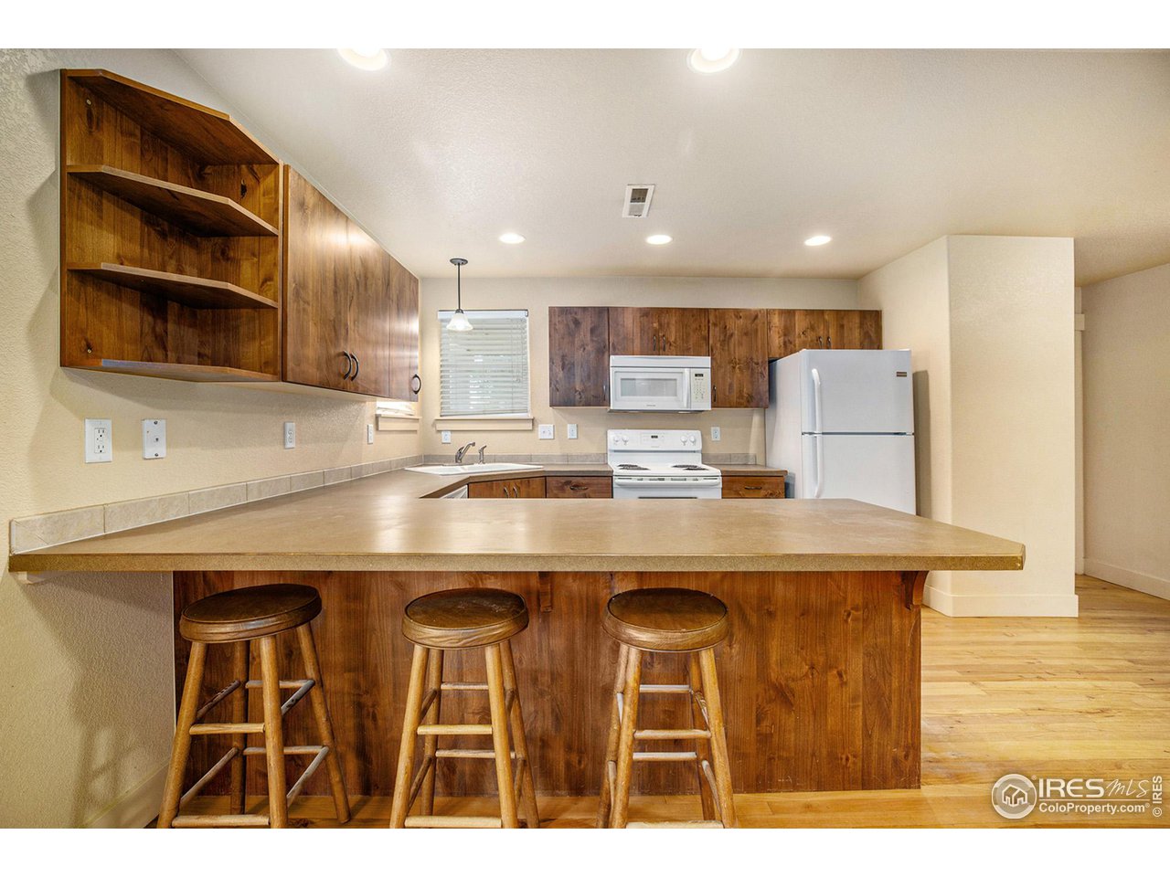 1001 23rd Street Road Greeley, CO 80631 - Photo 9 of 40 The kitchen has been tastefully redone