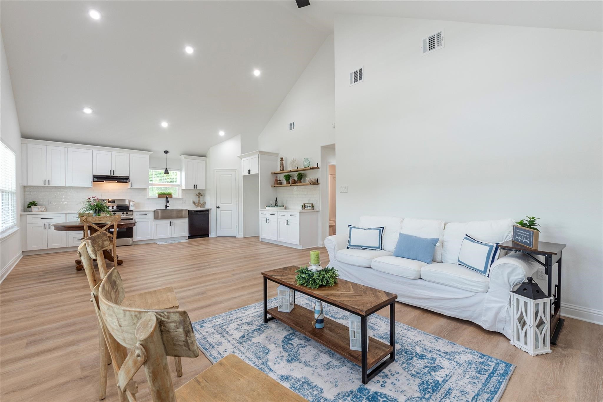 4213 Houx Street Bacliff, TX 77518 - Photo 2 of 37 a living room with furniture and a table