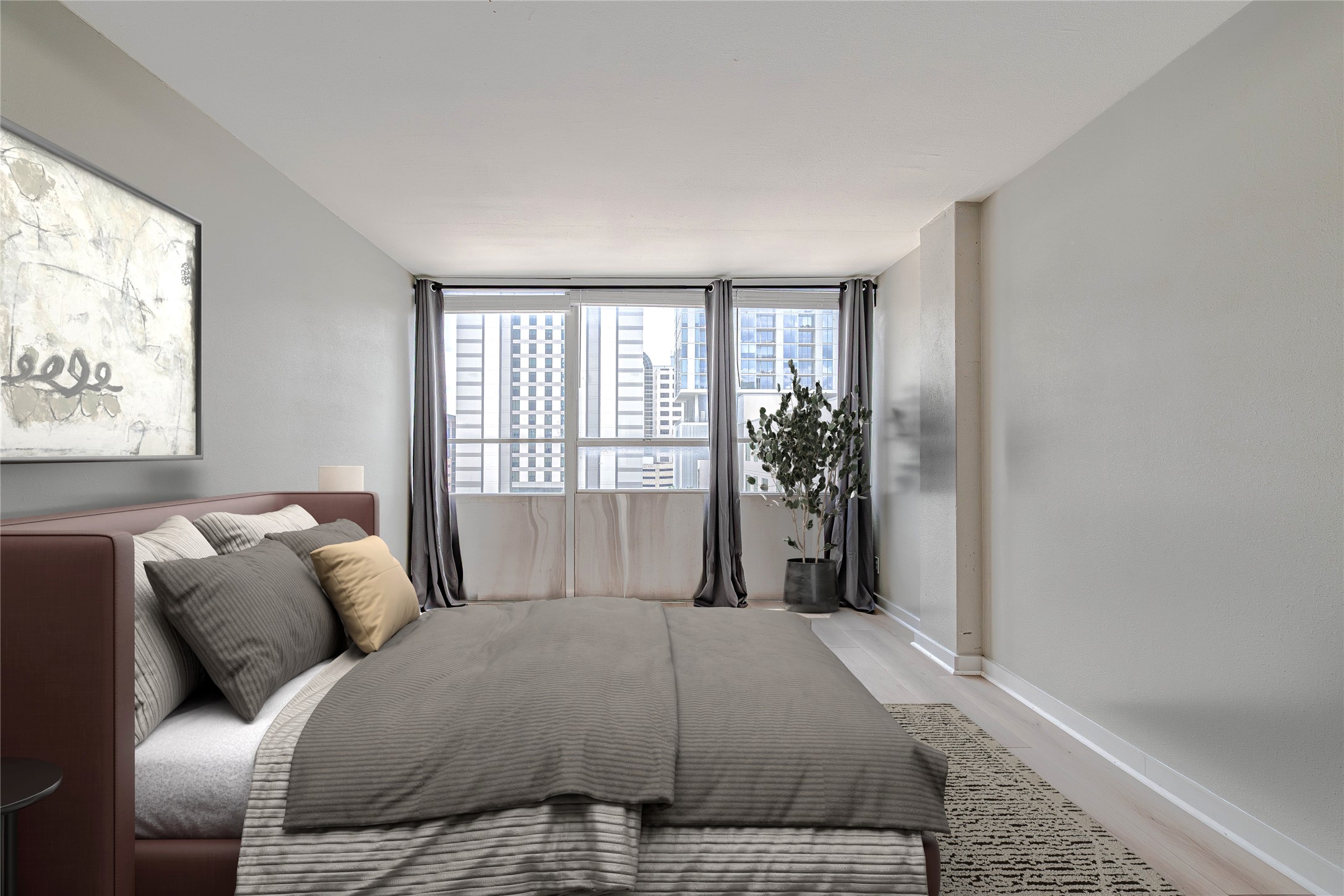 1800 Lavaca Street, Unit A705 Austin, TX 78701 - Photo 2 of 18 a bedroom with a bed and a window