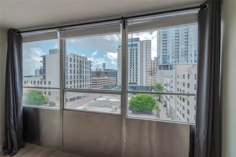 a view of a glass door with a view of the porch
