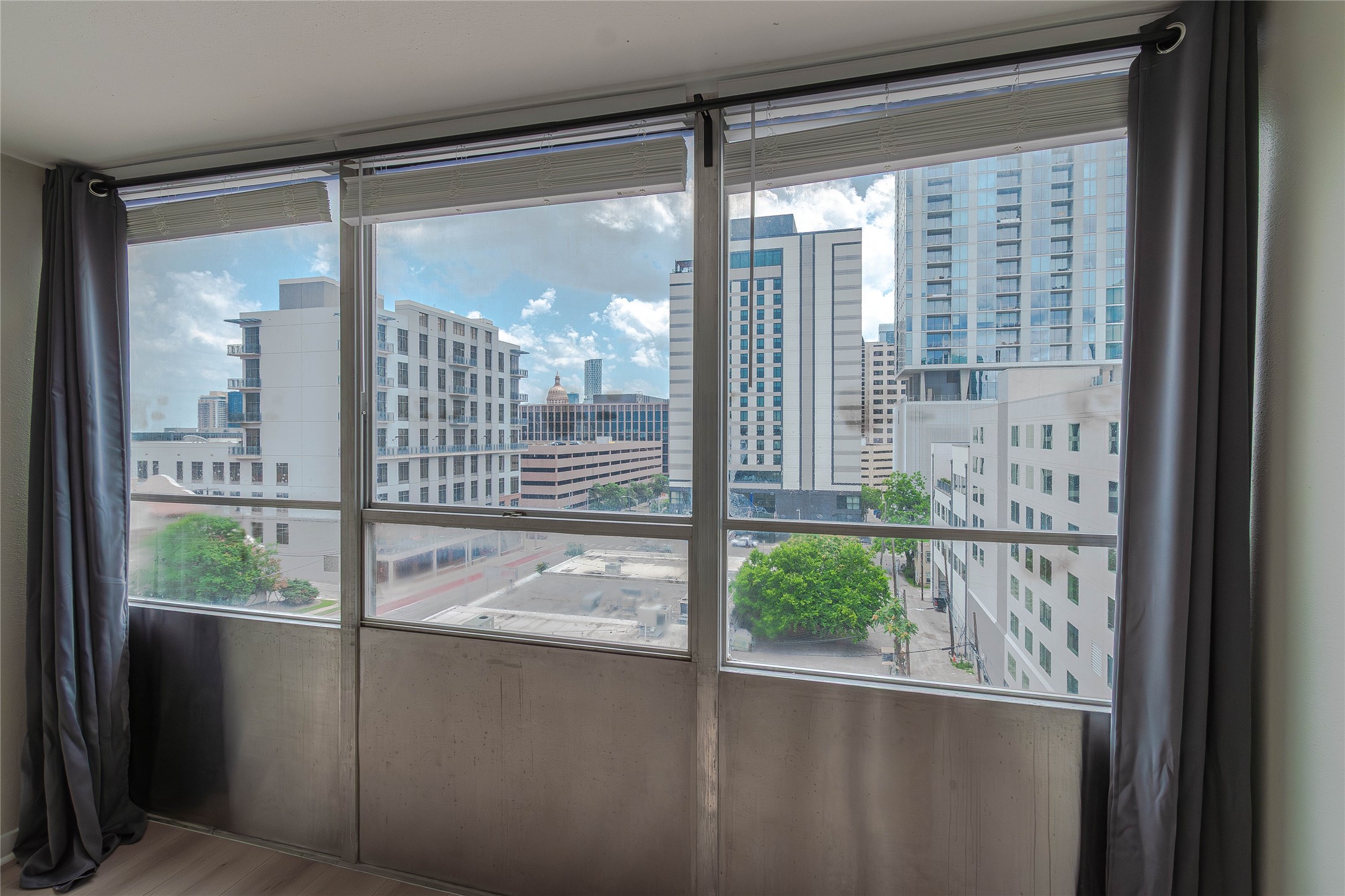 1800 Lavaca Street, Unit A705 Austin, TX 78701 - Photo 5 of 18 a view of a glass door with a view of the porch