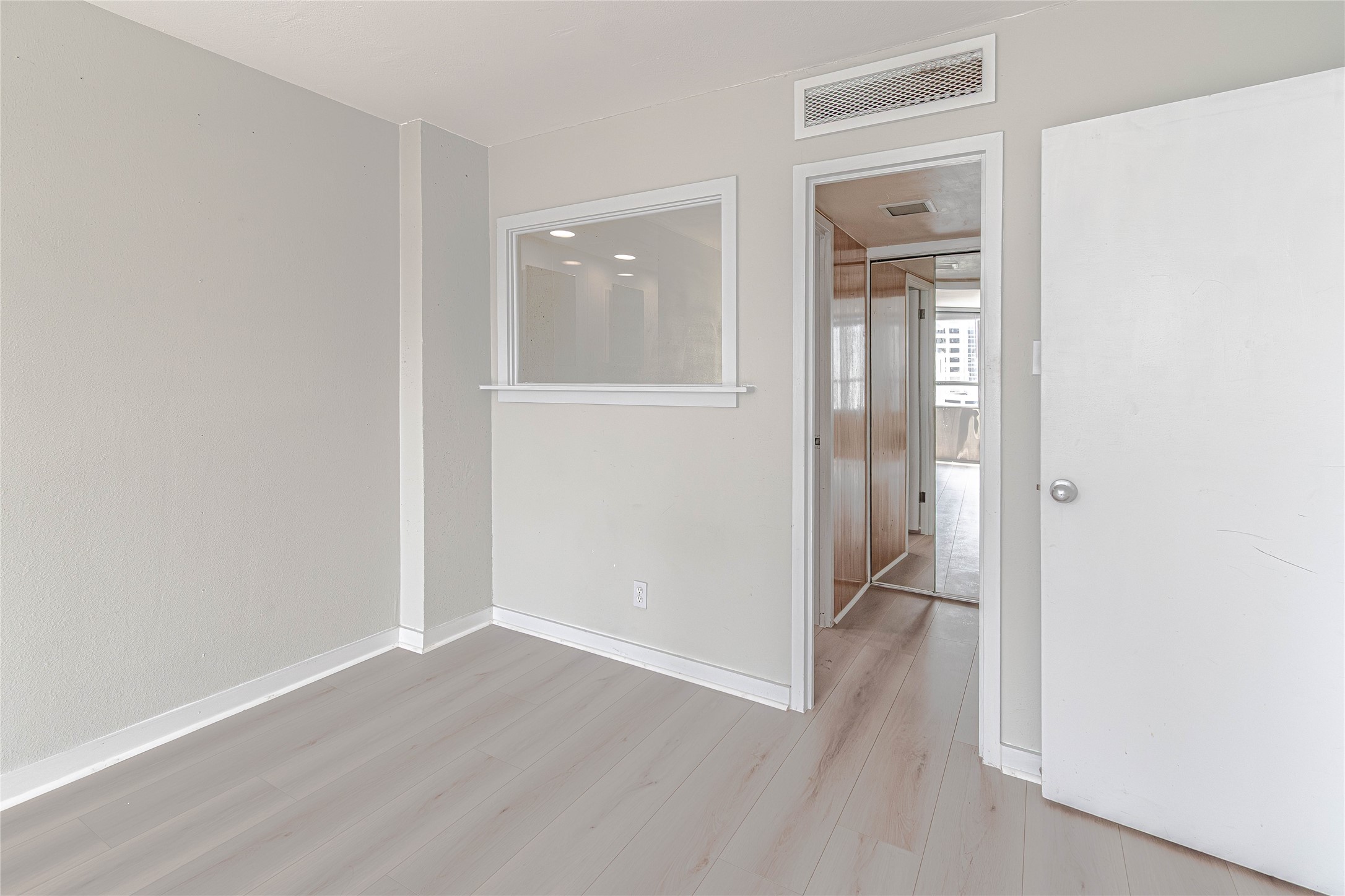 1800 Lavaca Street, Unit A705 Austin, TX 78701 - Photo 10 of 18 a view of a hallway with wooden floor