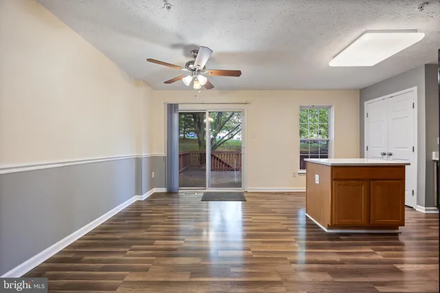 a view of a livingroom with wooden floor