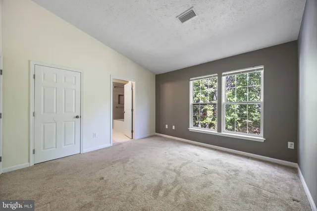 an empty room with an entryway