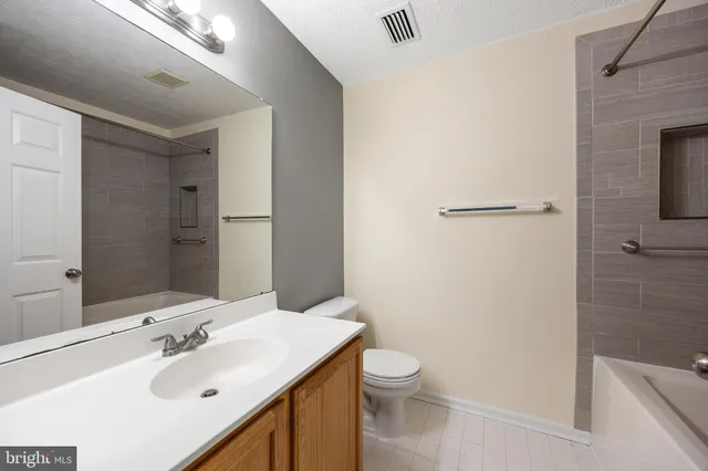 a close view of a bathtub in bathroom