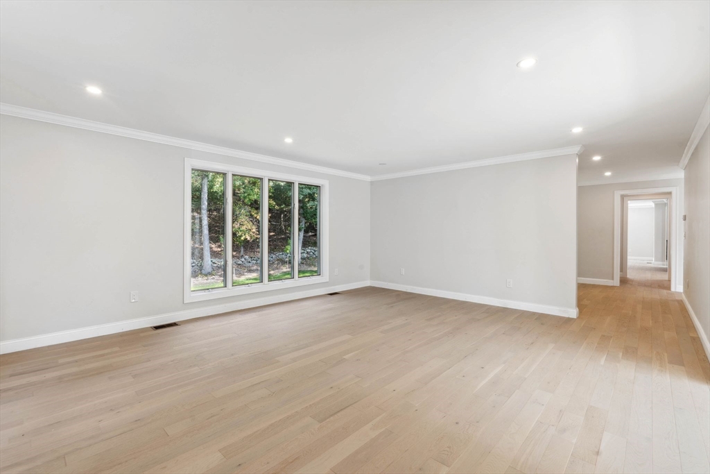 18 Pheasant Street Topsfield, MA 01983 - Photo 11 of 42 a view of an empty room with a window