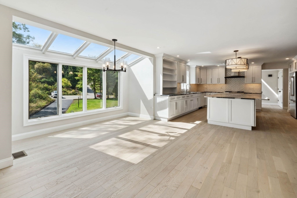 18 Pheasant Street Topsfield, MA 01983 - Photo 16 of 42 a view of a kitchen with furniture and a window