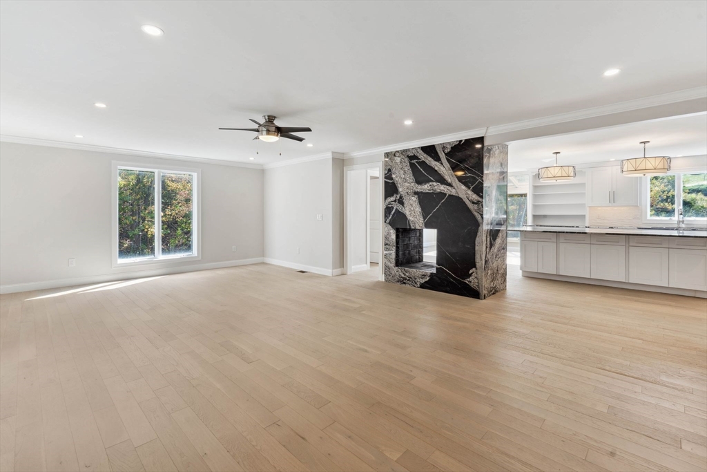 18 Pheasant Street Topsfield, MA 01983 - Photo 17 of 42 an empty room with furniture and a ceiling fan