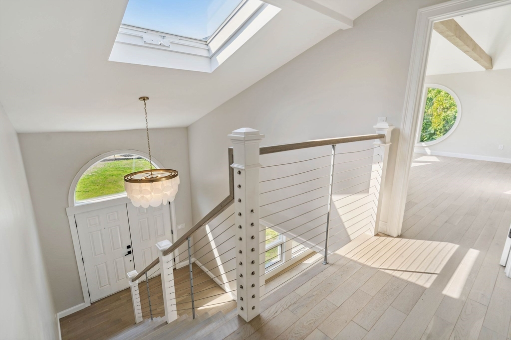 18 Pheasant Street Topsfield, MA 01983 - Photo 19 of 42 a view of an entryway with a table