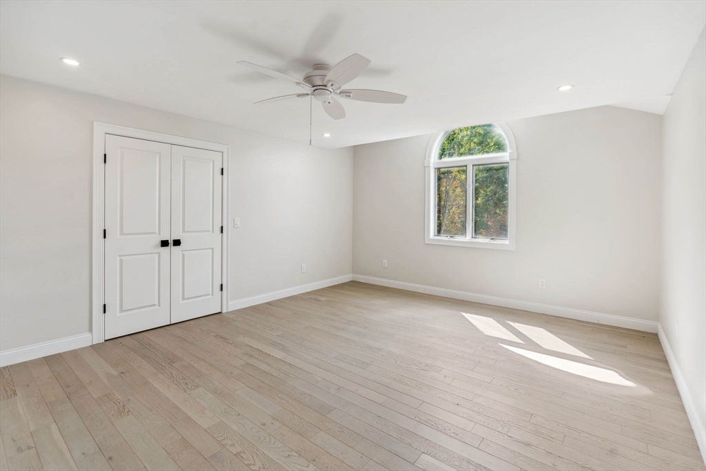 18 Pheasant Street Topsfield, MA 01983 - Photo 27 of 42 wooden floor in an empty room with a window