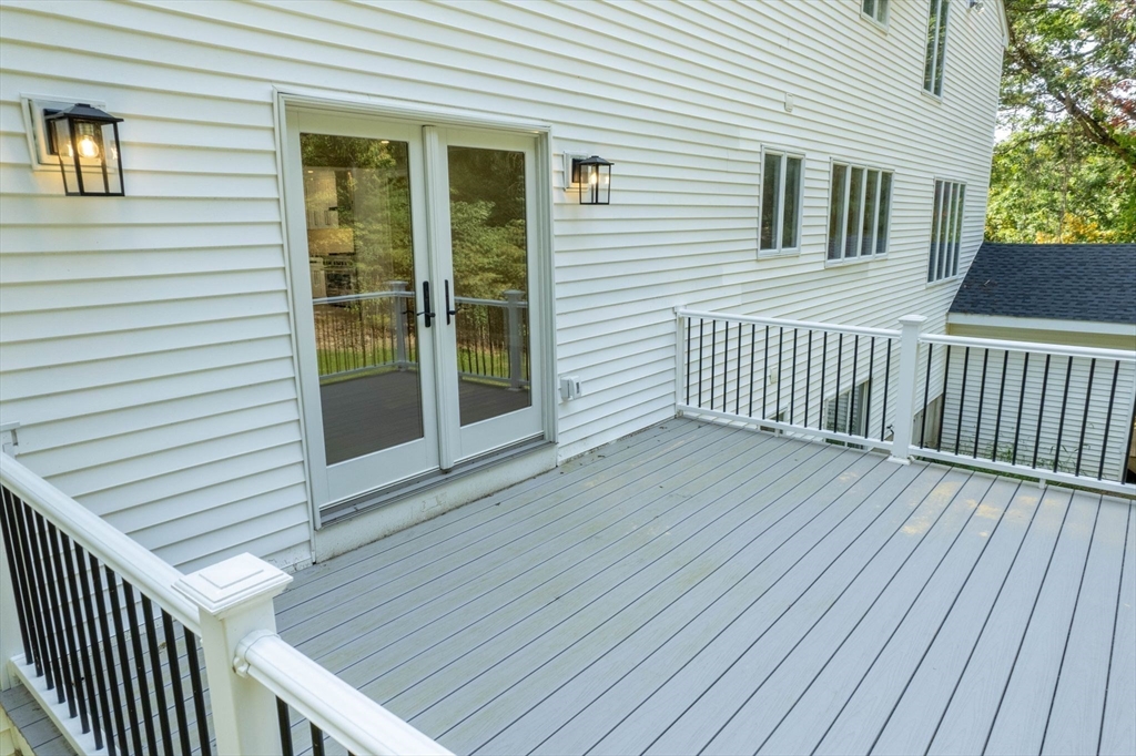 18 Pheasant Street Topsfield, MA 01983 - Photo 37 of 42 a view of a house with wooden floor