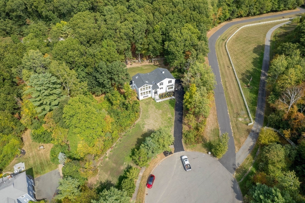 18 Pheasant Street Topsfield, MA 01983 - Photo 41 of 42 a aerial view of a house with a yard