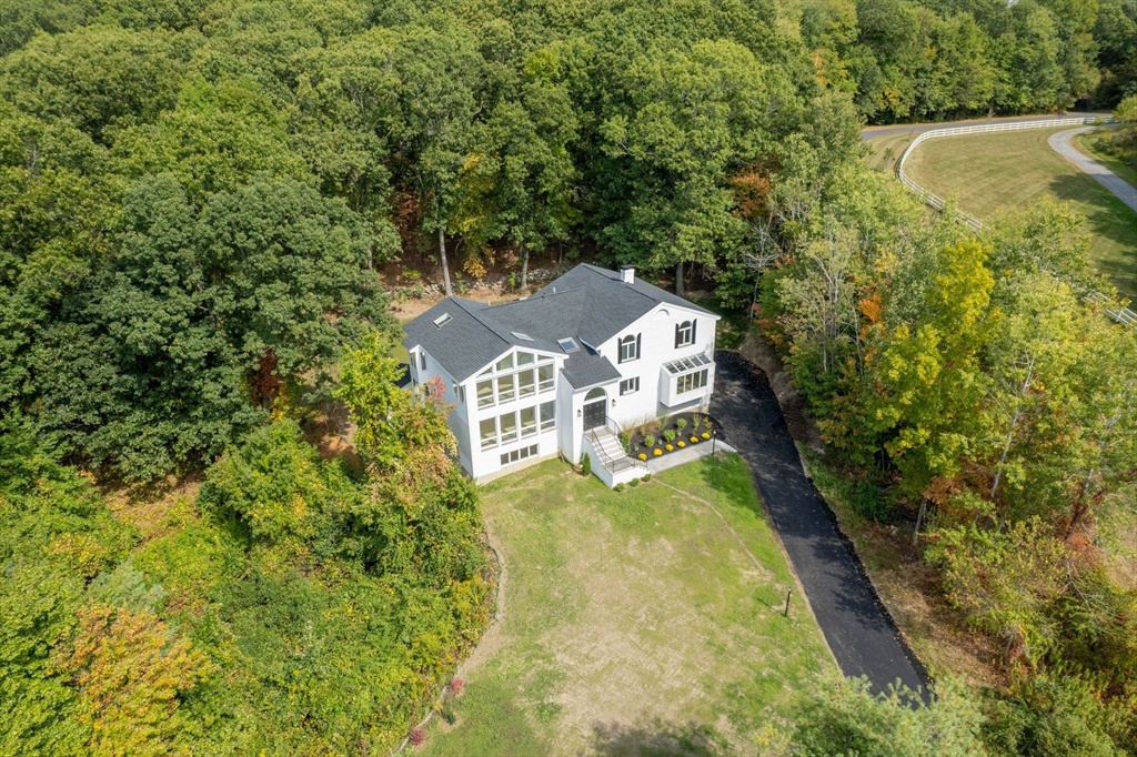 18 Pheasant Street Topsfield, MA 01983 - Photo 42 of 42 a view of a house with a yard