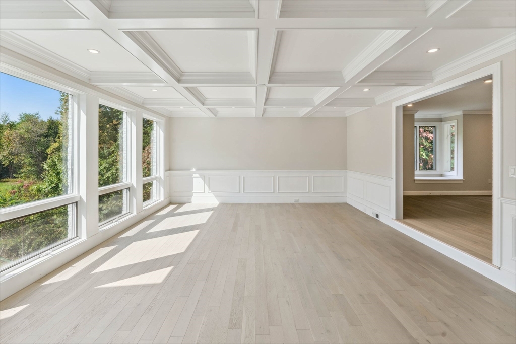 18 Pheasant Street Topsfield, MA 01983 - Photo 9 of 42 en empty room with windows