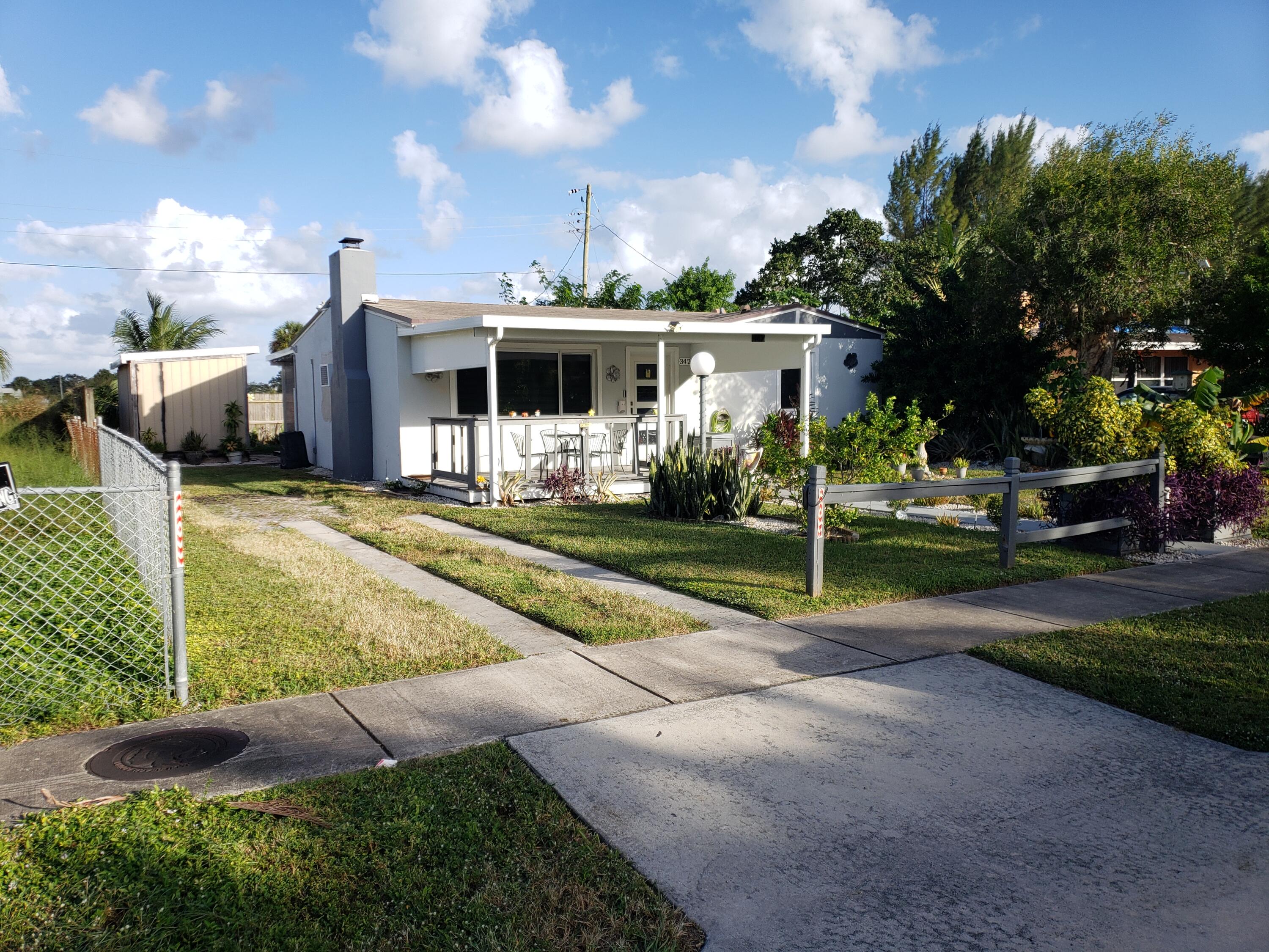 342 Hemlock Road West Palm Beach, FL 33409 - Photo 1 of 28 20231027_170814