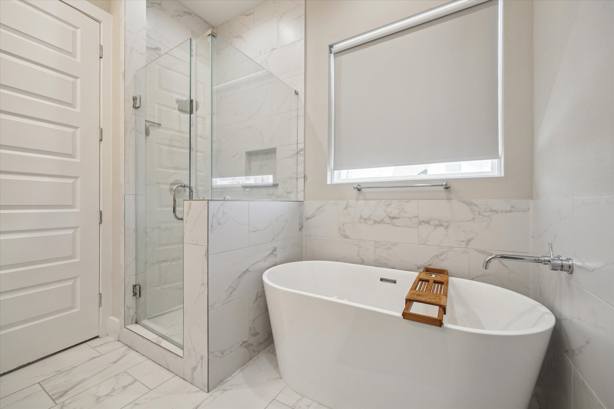 9414 Campbell Road, Unit F Houston, TX 77080 - Photo 15 of 26 a white bath tub sitting next to a white sink