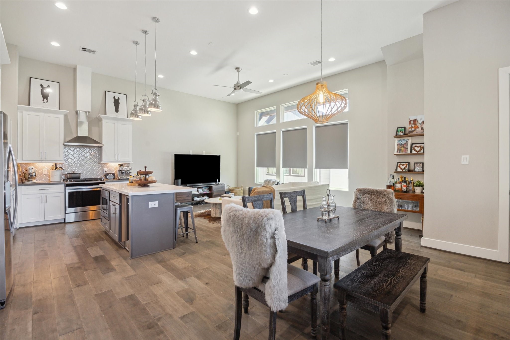 9414 Campbell Road, Unit F Houston, TX 77080 - Photo 6 of 26 a view of a dining room with furniture window and wooden floor