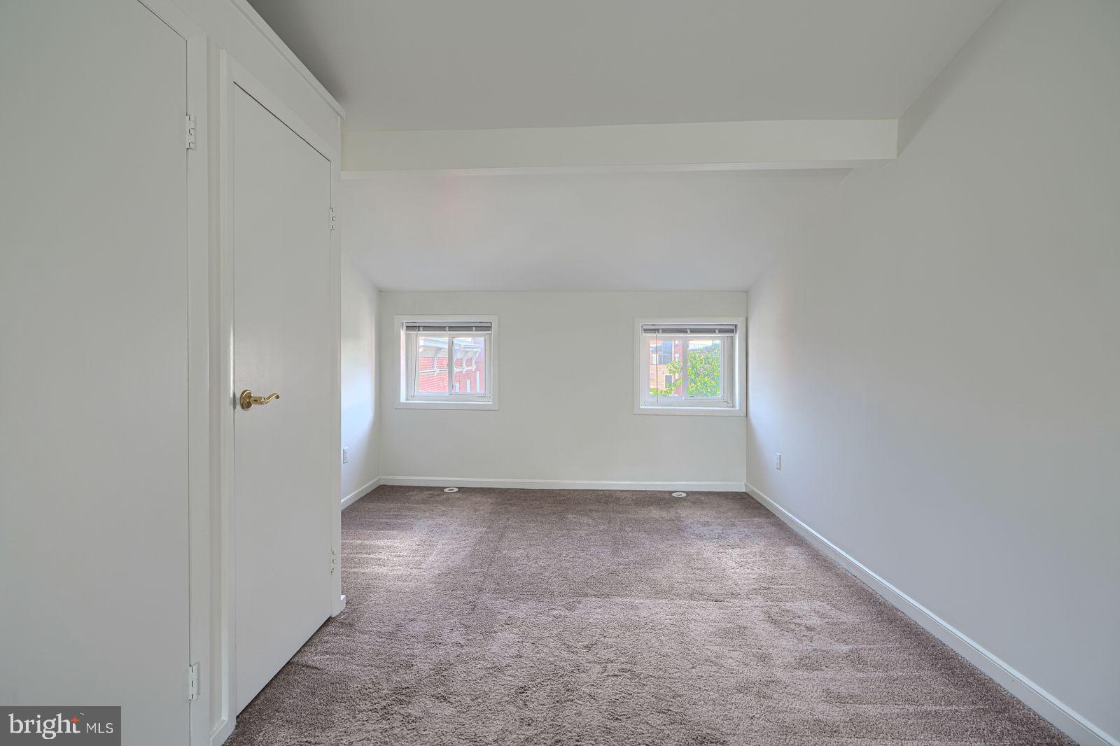 1026 Patapsco Street Baltimore, MD 21230 - Photo 18 of 24 an empty room with windows