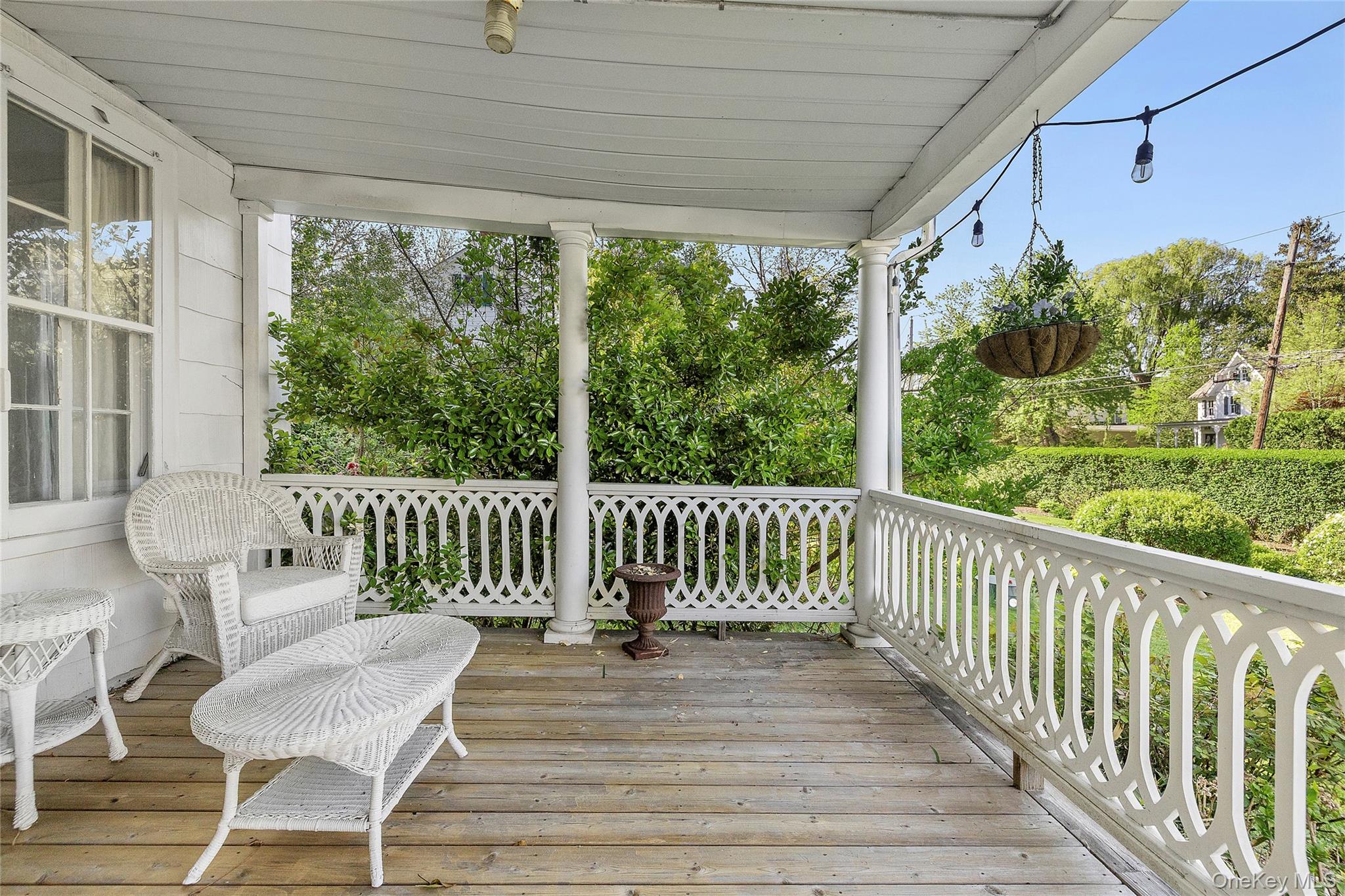 45 Shore Road Setauket, NY 11733 - Photo 30 of 45 Veranda Lounge Area Overlooking Shore Road and Harbor Across the Street