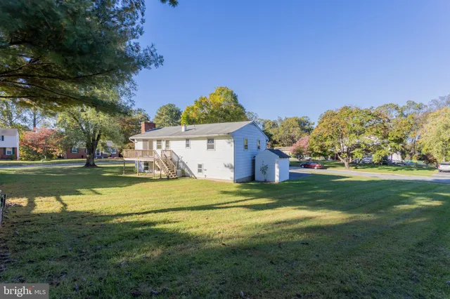 a view of a house with a big yard