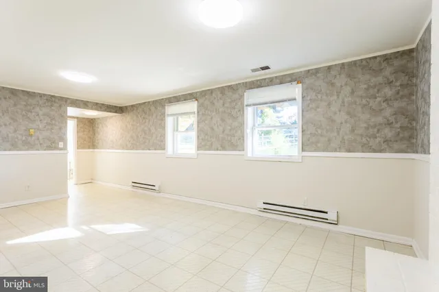 a view of a room with a large window