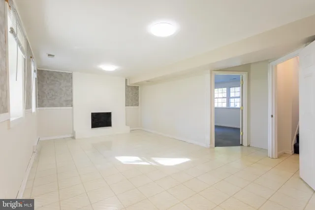 an empty room with windows