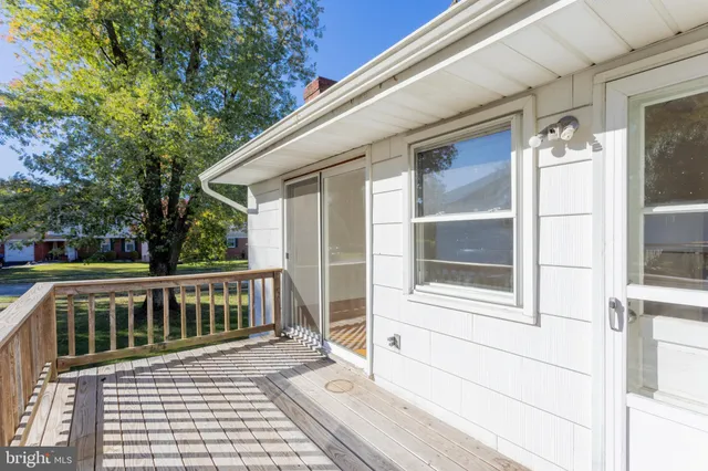 a view of a house with a large window