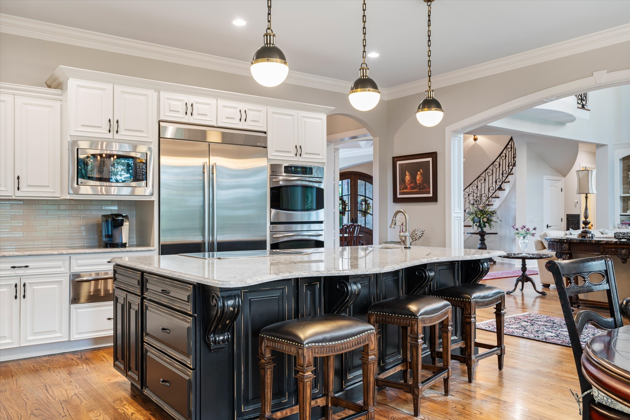 1521 Registry Row Arrington, TN 37014 - Photo 16 of 54 a kitchen with cabinets a counter and chairs in it