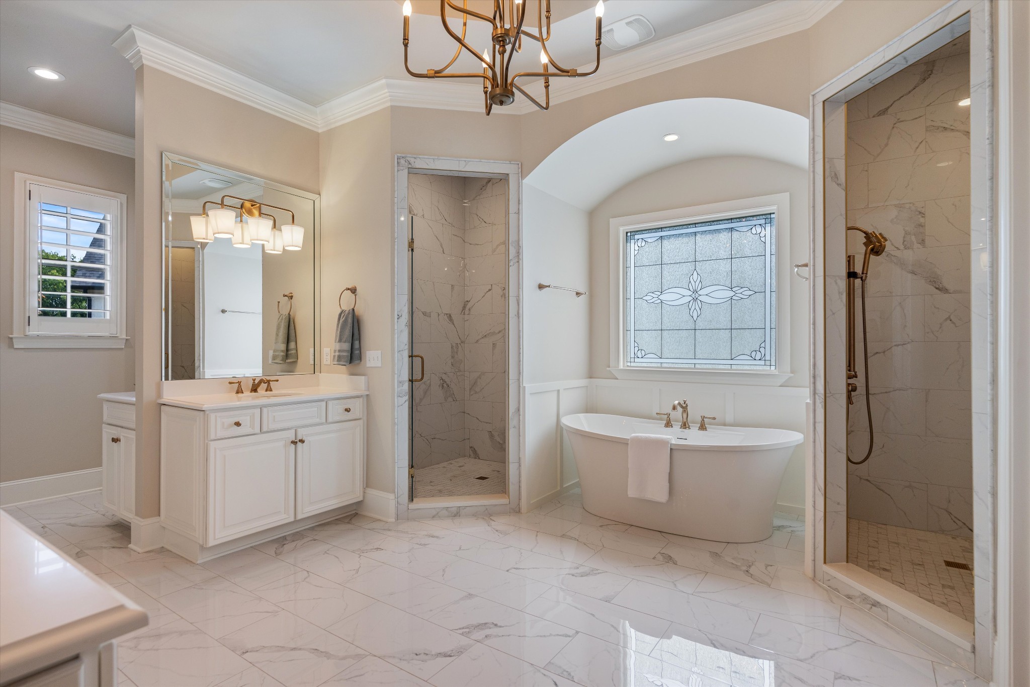 1521 Registry Row Arrington, TN 37014 - Photo 22 of 54 a spacious bathroom with a double vanity sink a mirror and a bathtub
