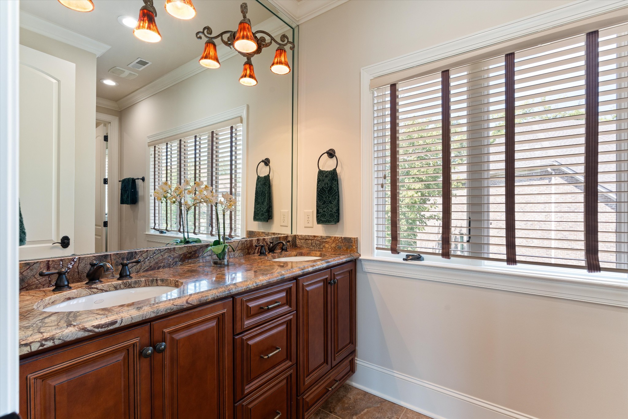 1521 Registry Row Arrington, TN 37014 - Photo 37 of 54 a bathroom with a granite countertop sink and a large mirror