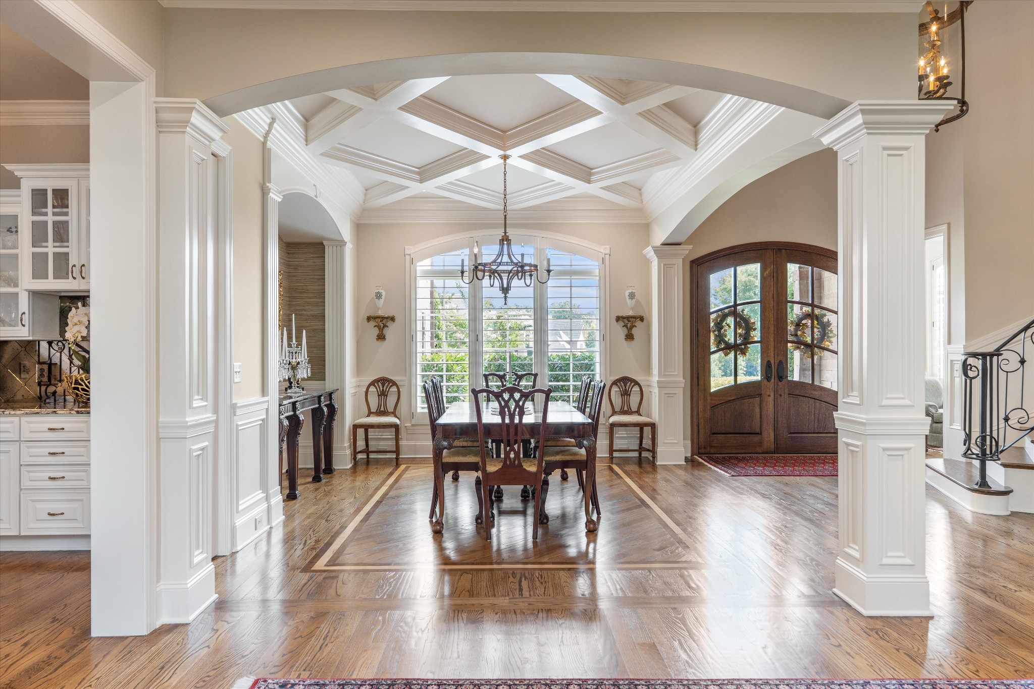 1521 Registry Row Arrington, TN 37014 - Photo 7 of 54 a dining room with wooden floor a chandelier a glass table and chairs