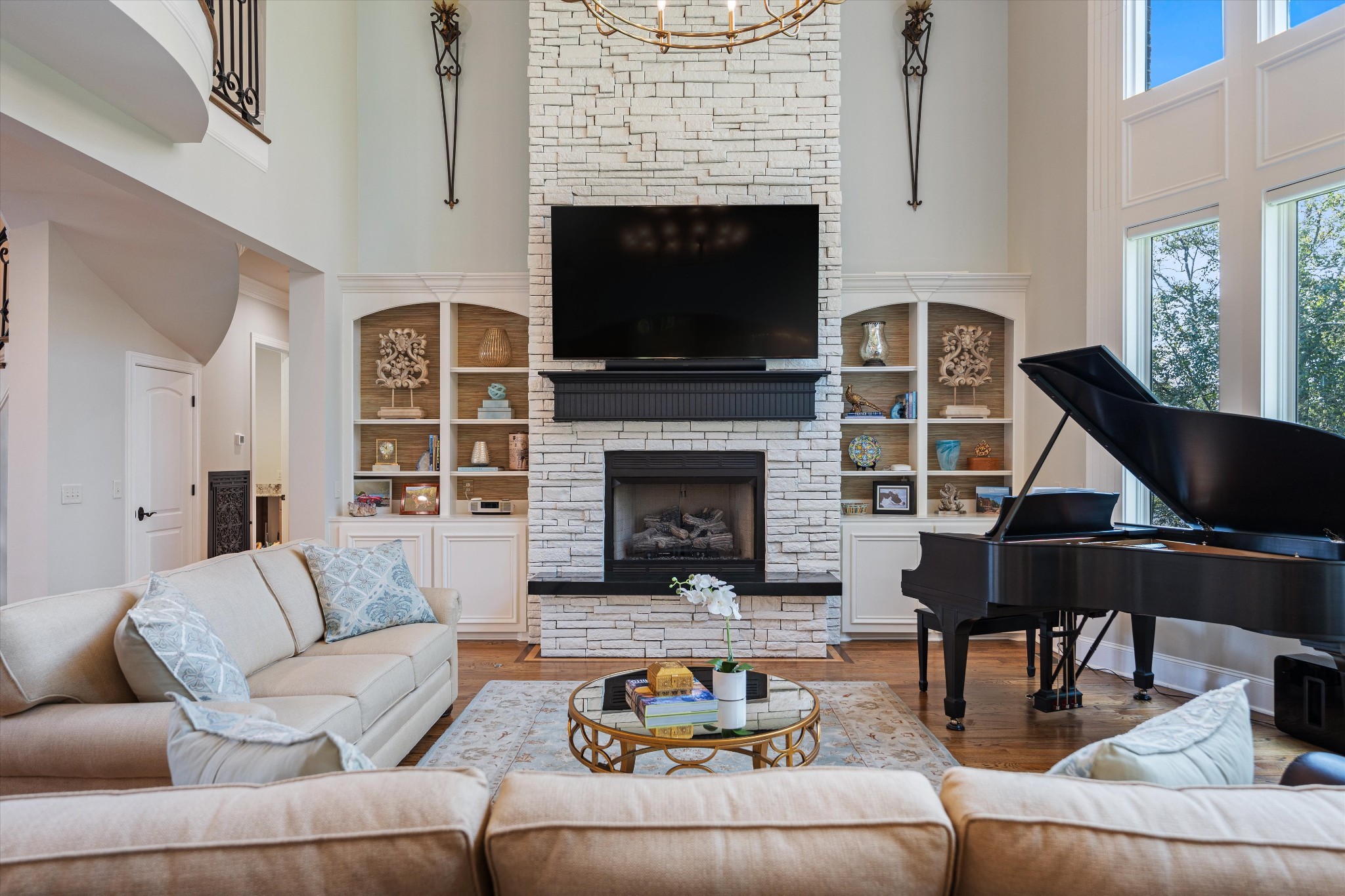 1521 Registry Row Arrington, TN 37014 - Photo 10 of 54 a living room with furniture a flat screen tv and a fireplace