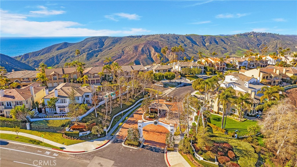 23 Coronado Pointe Laguna Niguel, CA 92677 - Photo 16 of 16 a view of a swimming pool with a table and chairs