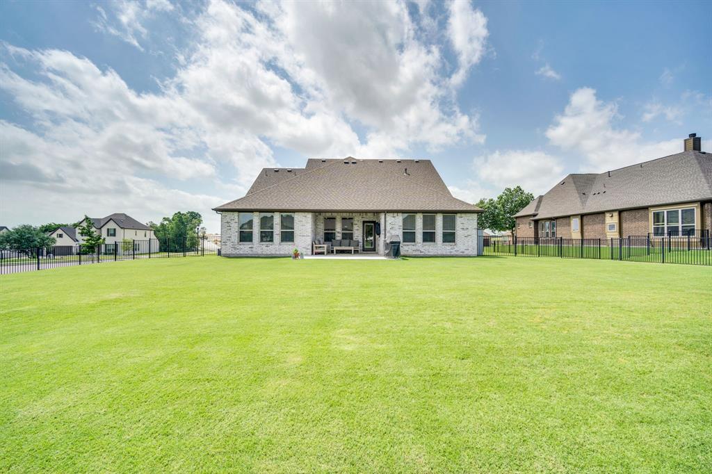 1601 Bear Path Way Gunter, TX 75058 - Photo 34 of 40 a front view of a house with garden