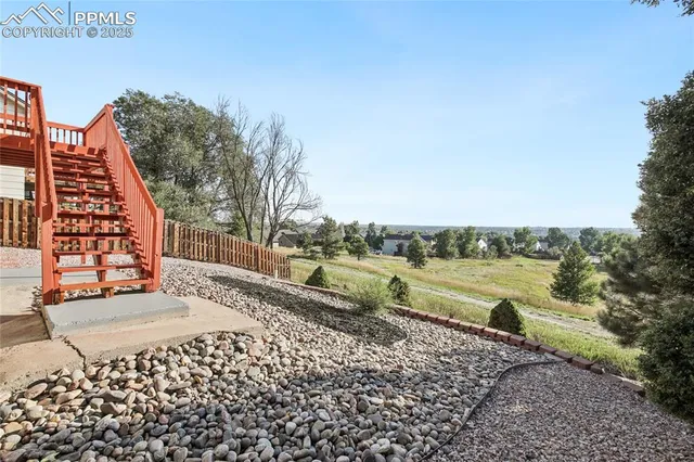 a view of a pathway with a lake