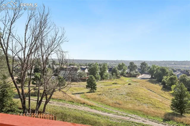 a view of a lake from a balcony