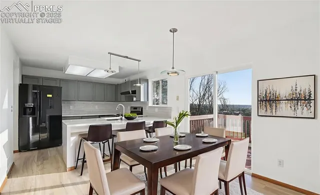 a view of a dining room with furniture