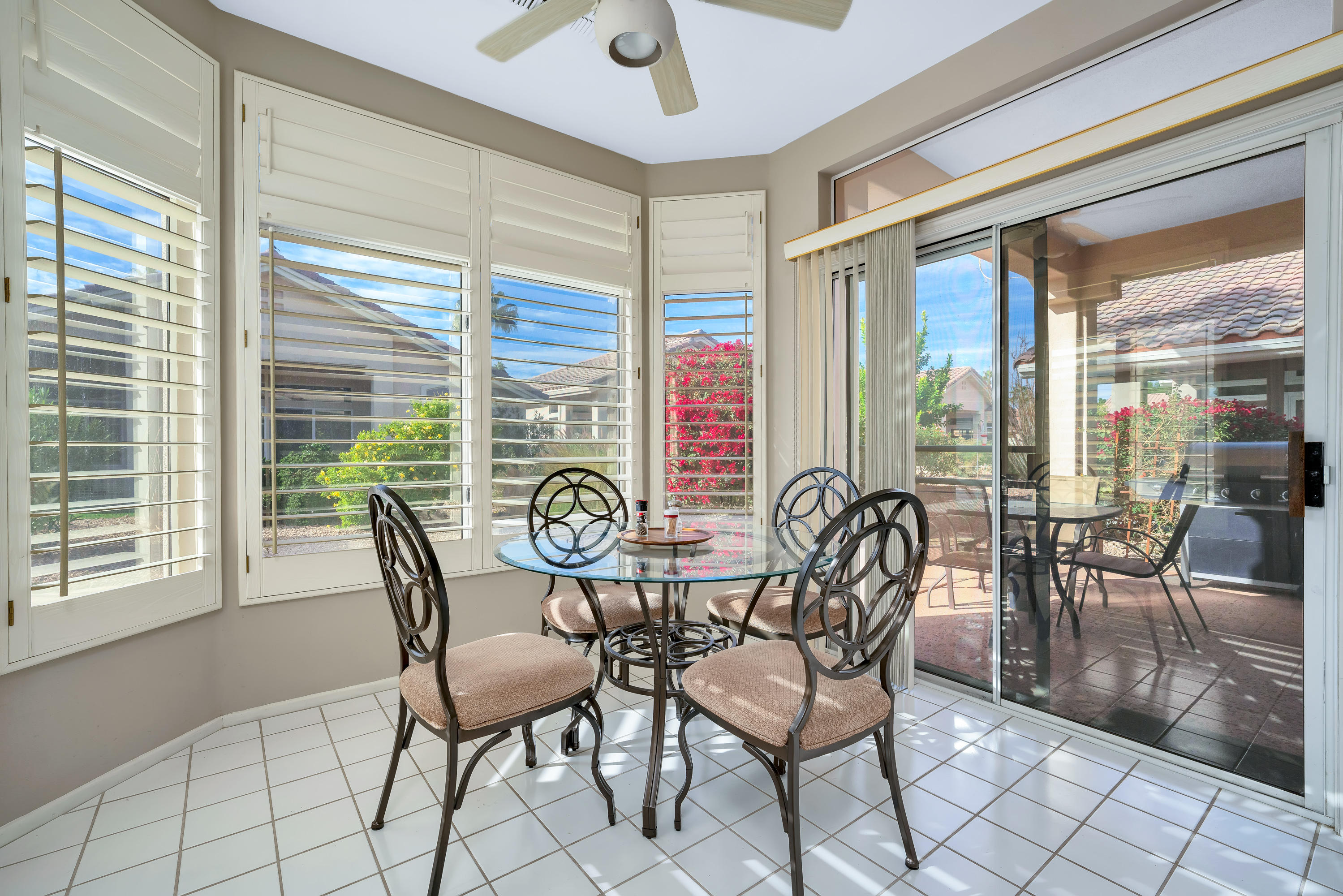 37395 Purple Shadow Road Palm Desert, CA 92211 - Photo 14 of 19 a view of a dining room with furniture window and outside view