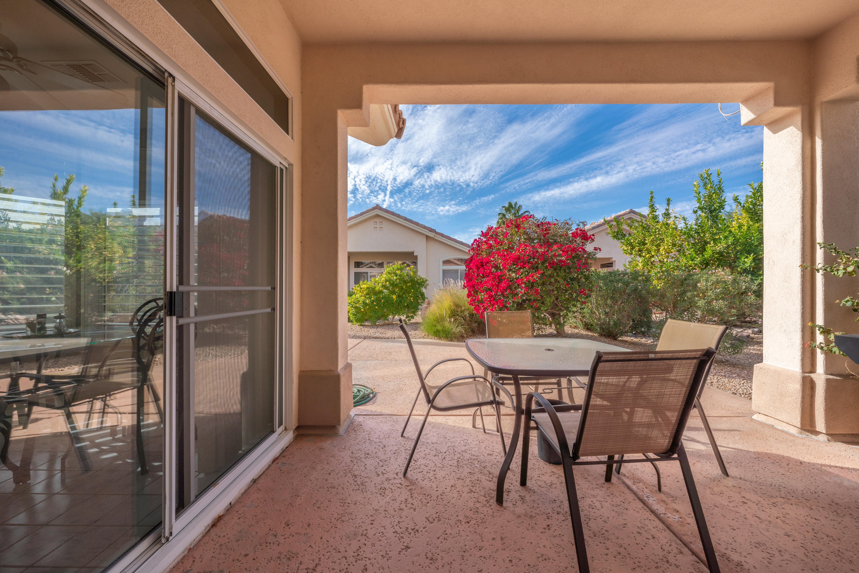 37395 Purple Shadow Road Palm Desert, CA 92211 - Photo 3 of 19 a view of a dining room with furniture window and outside view
