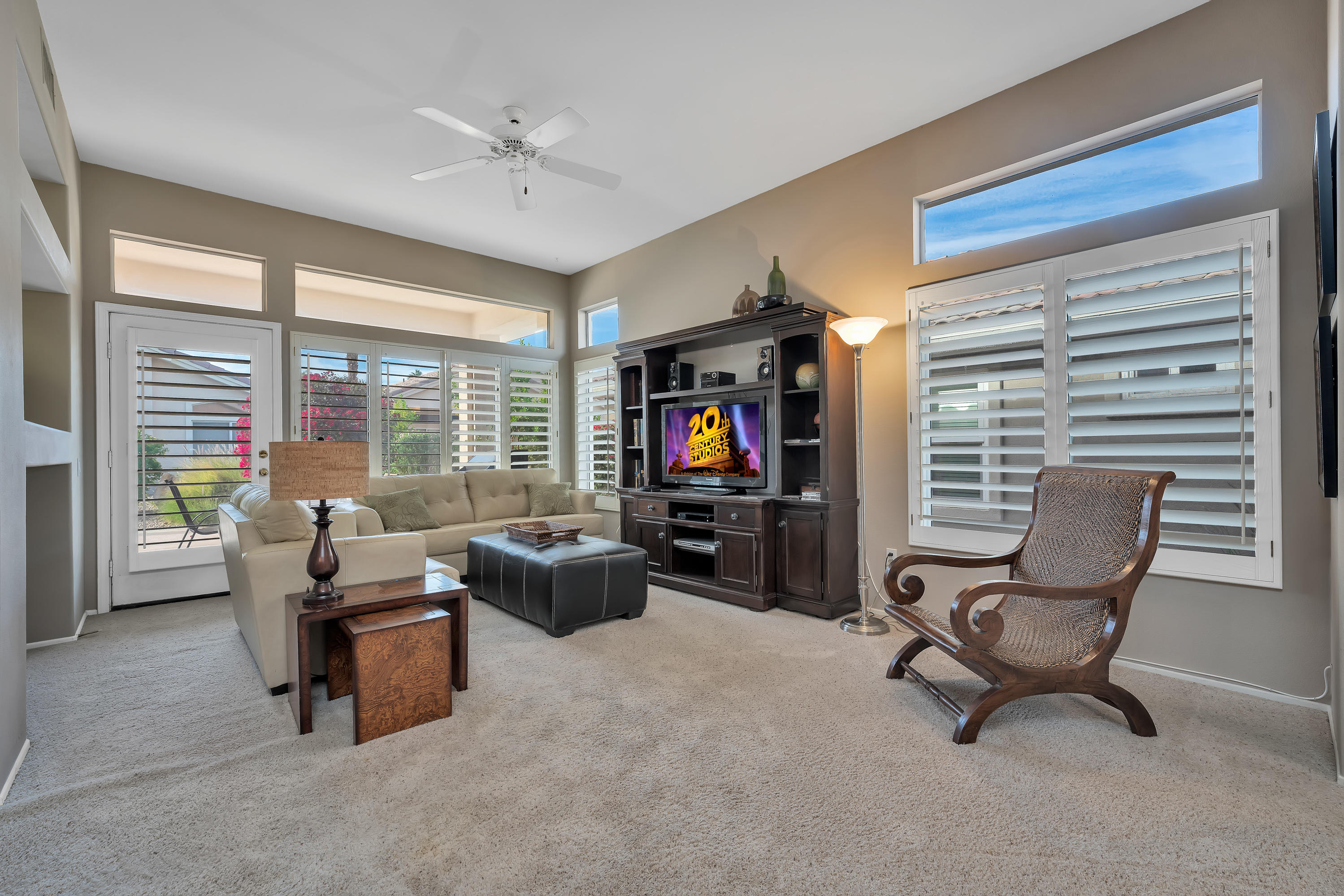 37395 Purple Shadow Road Palm Desert, CA 92211 - Photo 8 of 19 a living room with furniture and a flat screen tv