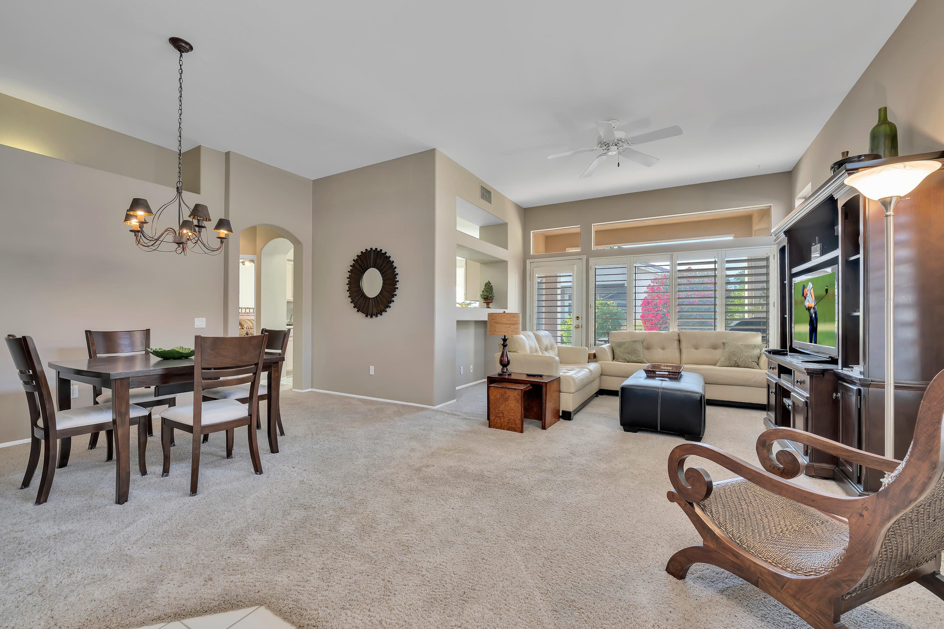 37395 Purple Shadow Road Palm Desert, CA 92211 - Photo 9 of 19 a dining room with furniture a chandelier and window