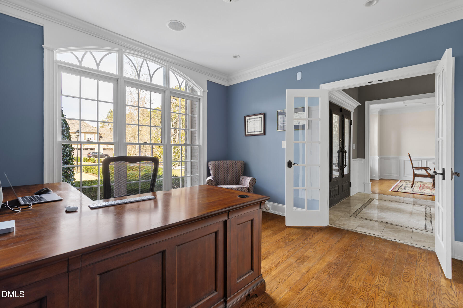 112 Winding Ridge Road Durham, NC 27713 - Photo 64 of 84 a view of a workspace room with wooden floor and a window