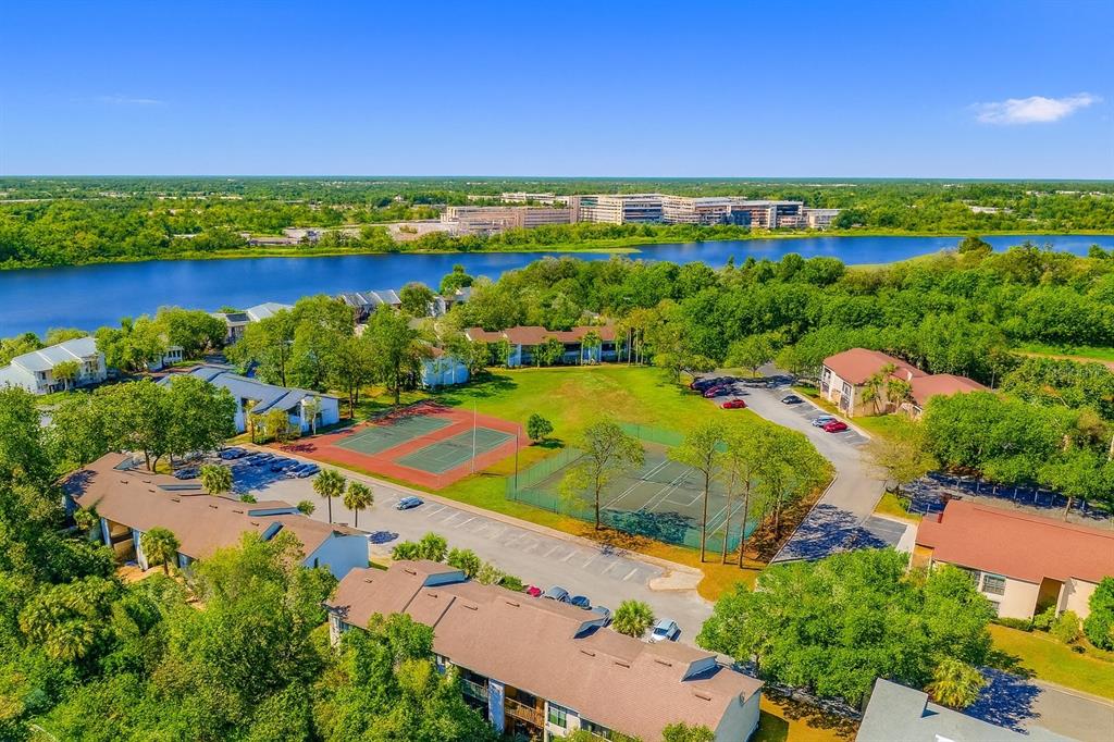 2604 Lemon Tree Lane, Unit C Orlando, FL 32839 - Photo 13 of 24 an aerial view of tennis court