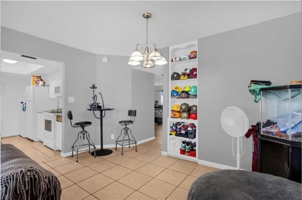 2604 Lemon Tree Lane, Unit C Orlando, FL 32839 - Photo 20 of 24 a view of a room with gym equipment