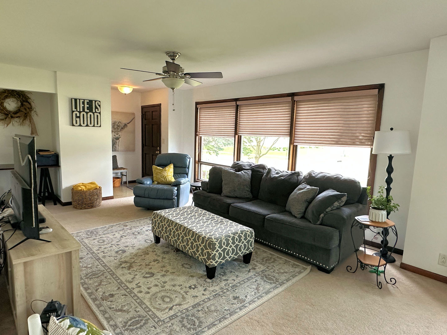1401 Crest Lane Rochelle, IL 61068 - Photo 5 of 10 a living room with furniture and a large window